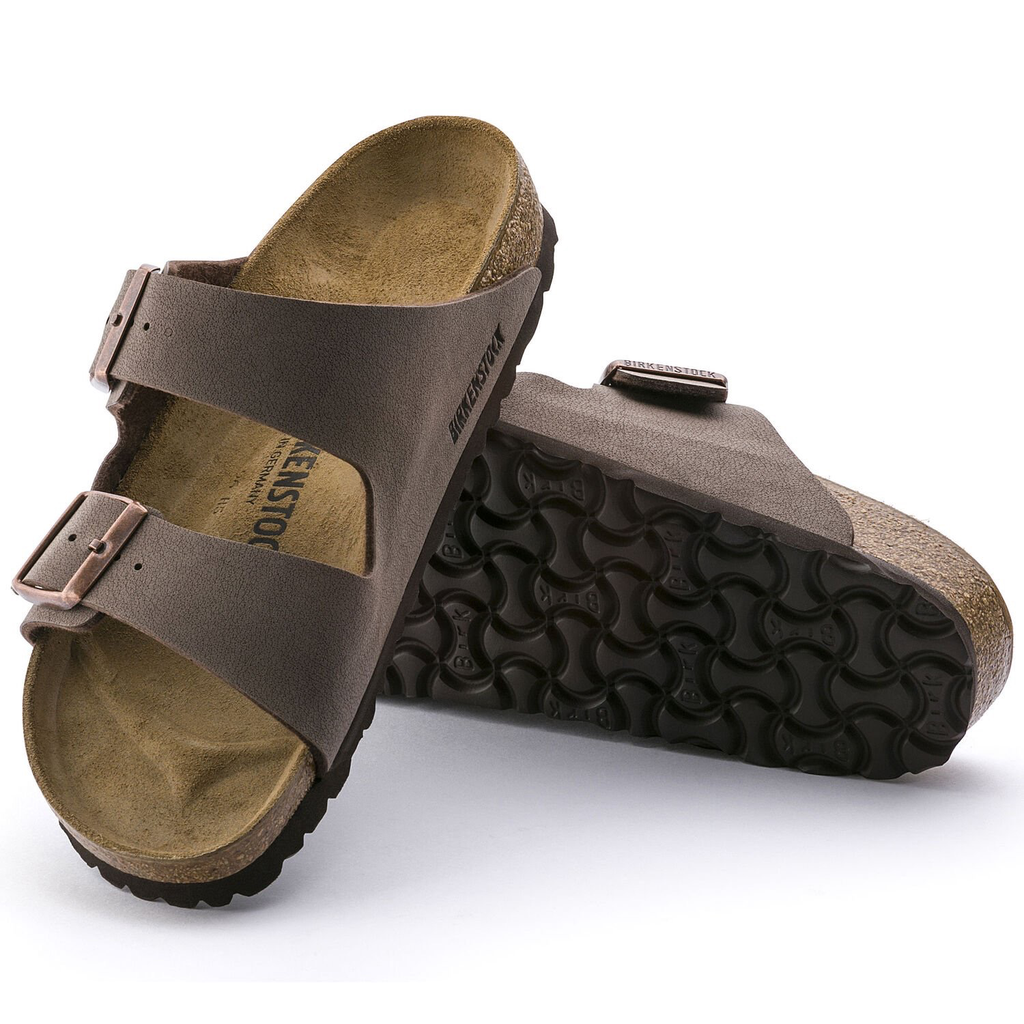 Brown sandals with cork sole on a white background
